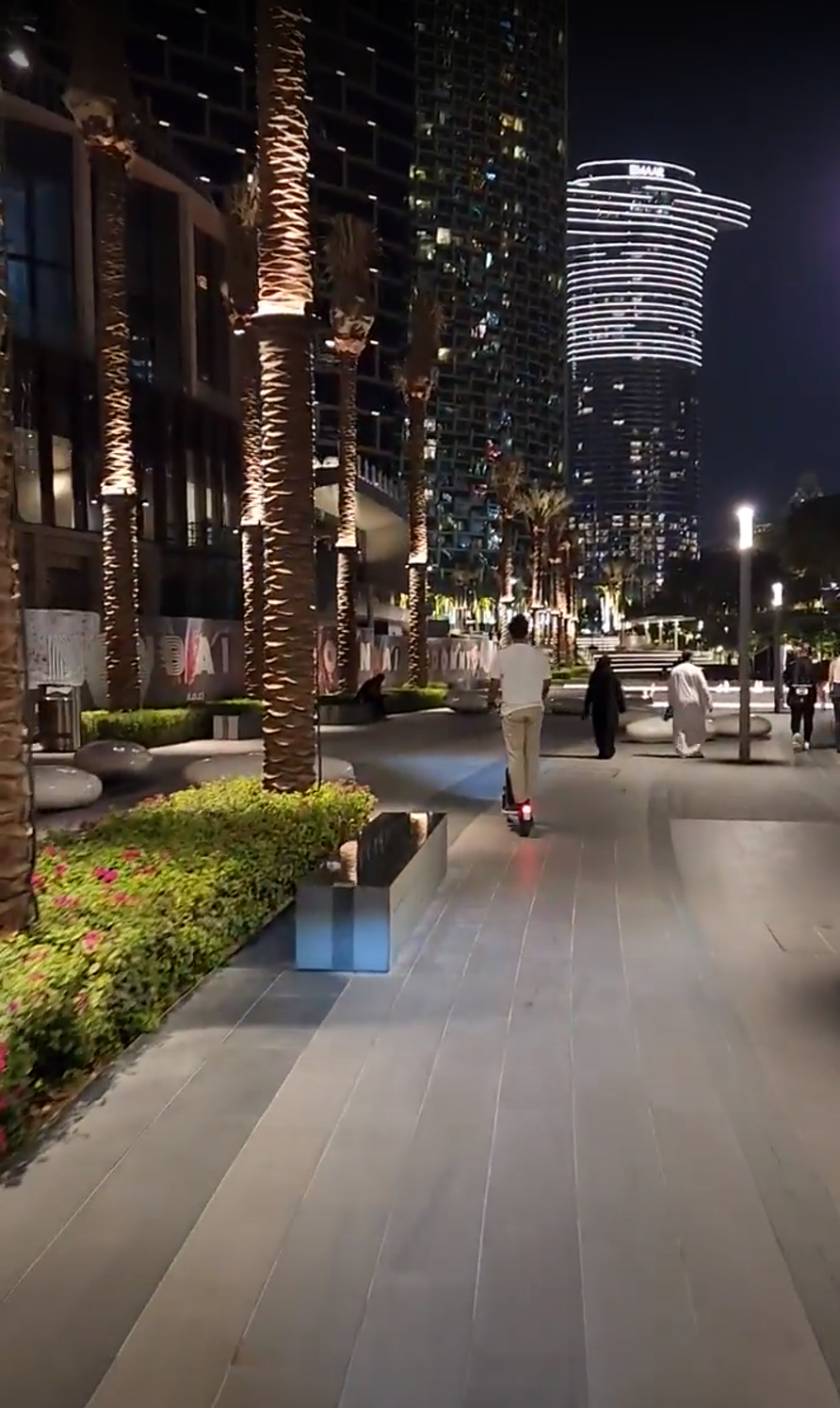 Lime bike ride through the lighted streets of Dubai